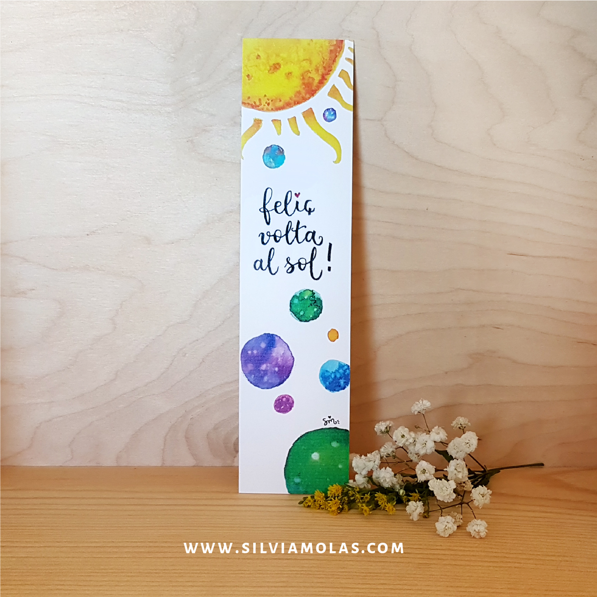 Punt de llibre “Feliç volta al sol”