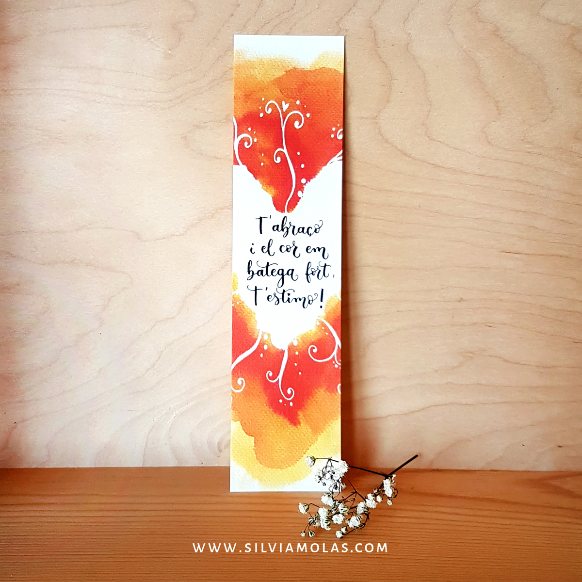 Punt de llibre “T’abraço, i el cor em batega fort, t’estimo!”