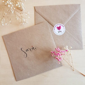 Sobre_14x14_Etiq_CAT_01-TRADUIDA