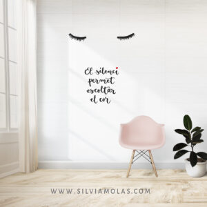 Pink chair and plant against a wall mockup